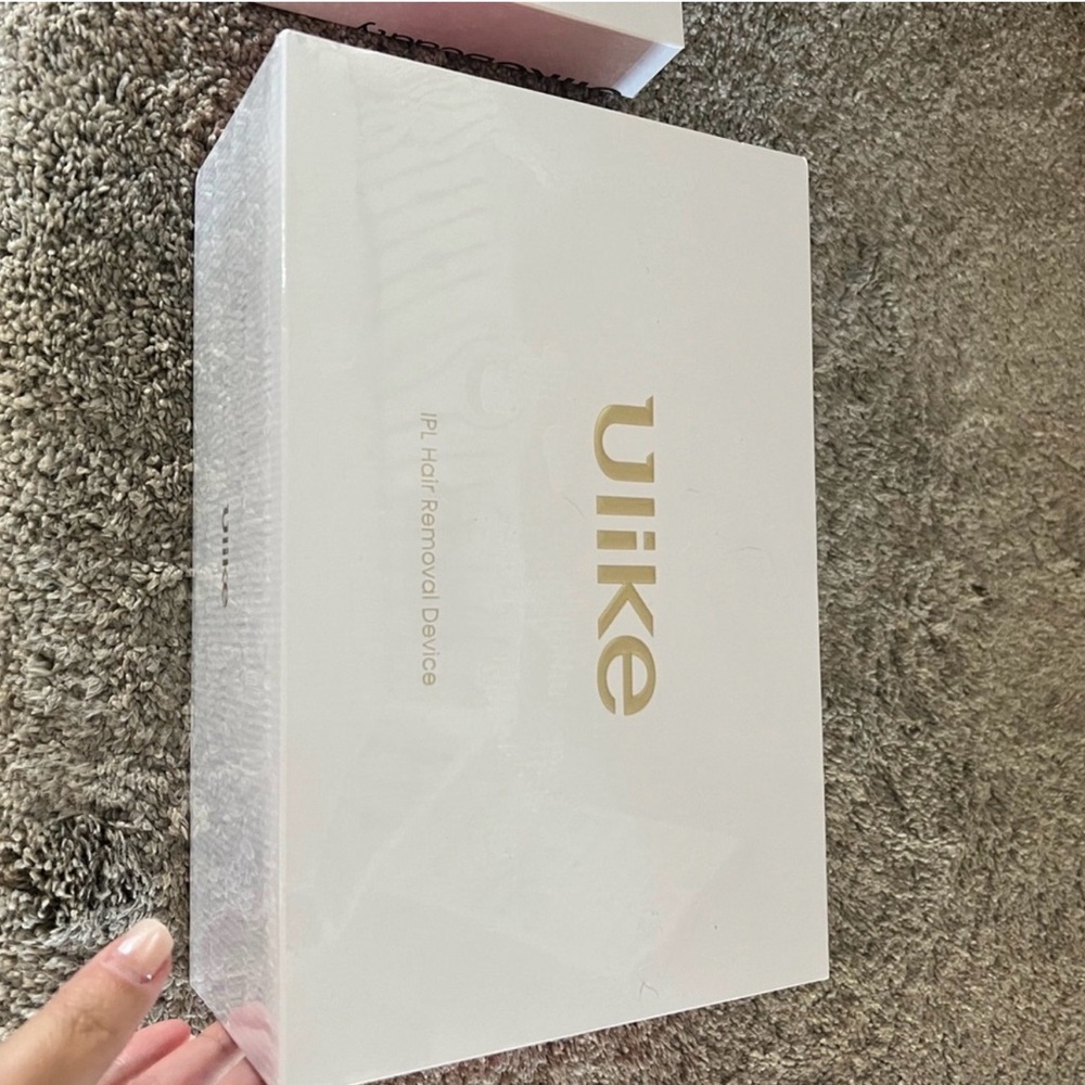 Ulike IPL HAIR REMOVAL DEVICE. Brand new in sealed box never opened.